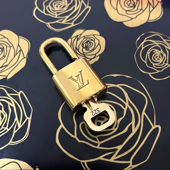 Louis Vuitton Handbags - #322 Authentic Louis Vuitton lock and key set